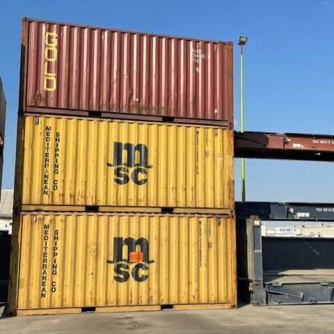 Three 20ft containers on top of each other
